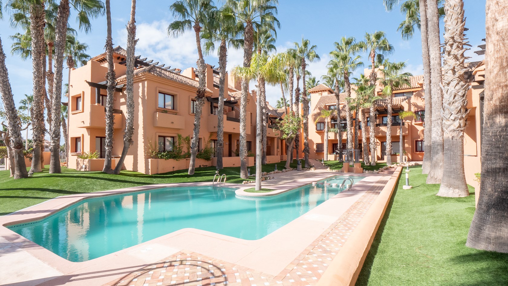 Landscaped community pool and gardens